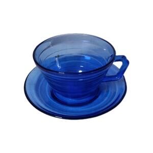 Hazel-Atlas Moderntone cobalt blue depression glass cup and saucer set. 